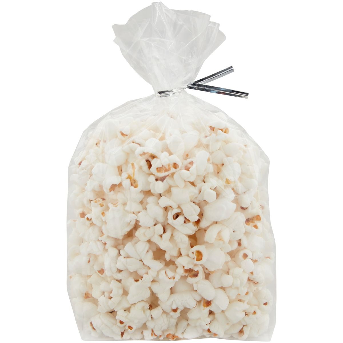 Doorzichtig uitdeelzakje van Wilton gevuld met popcorn en gesloten met een zilveren twist tie