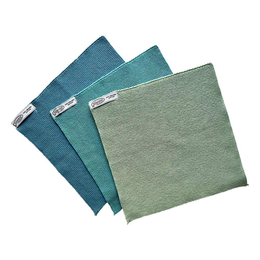 Solwang Design Vaatdoekjes set van 3 - Zeeschuim Combi drie doekjes gewaaierd tegen elkaar aan in petrolblauw, turquoise en mintgroen, elk met het Solwang-label zichtbaar.