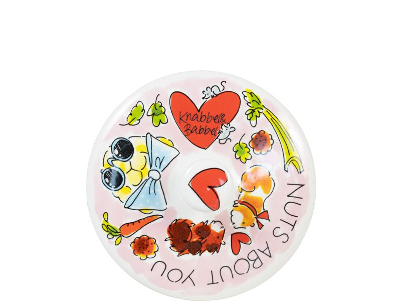 Blond Amsterdam deksel van bovenaf, ander decor met 'Nuts about you', 'Knabbel & Babbel' en cavia's.