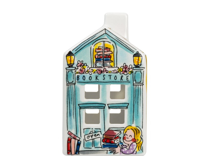 Blond Amsterdam Lichthuisje Bookstore, voorgevel met bordje 'is open', lantaarns en een meisje met een stapel boeken