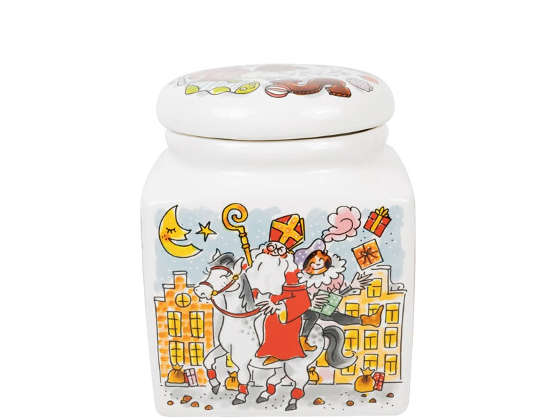 Voorzijde van de pot met Sinterklaas te paard en een Piet met een cadeau