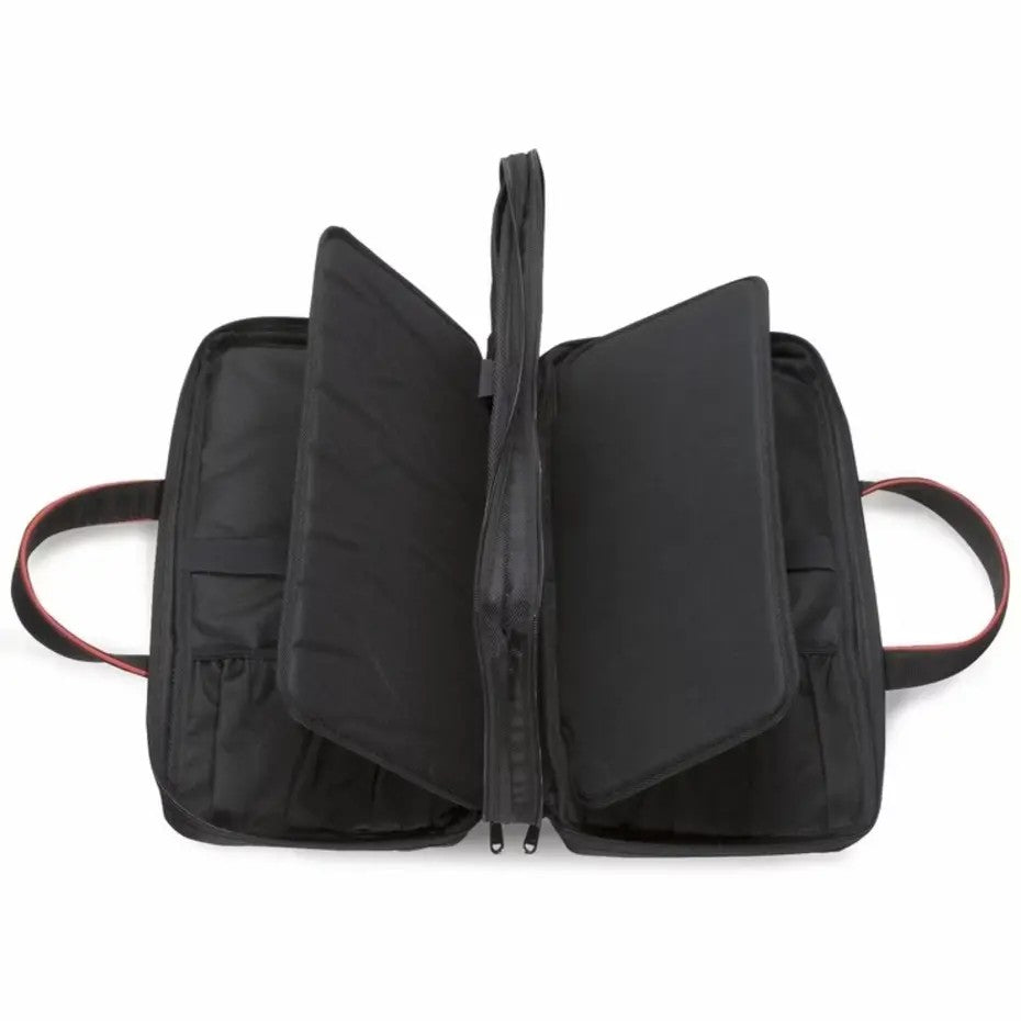 Geopende Wüsthof messentas met twee interne flappen en elastische lussen voor messen.