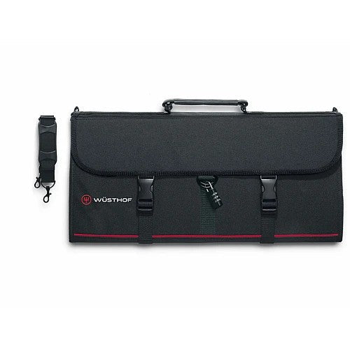 Opgevouwen Wüsthof messentas in zwart nylon met rode bies, handgreep en schouderband.