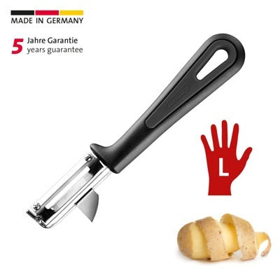 Westmark Dunschiller Linkshandig, zwart, los schilmesje met RVS mesje naast een geschilde aardappel