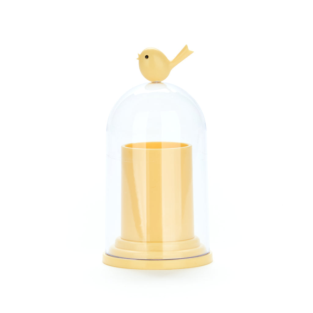 Gele Birdie met lege stolp, het gele bakje is zichtbaar door het doorzichtige plastic