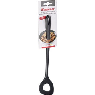 Westmark Gentle Plus Risottolepel met Gat, zwart, op de verpakkingskaart met foto van een gerecht in een pan