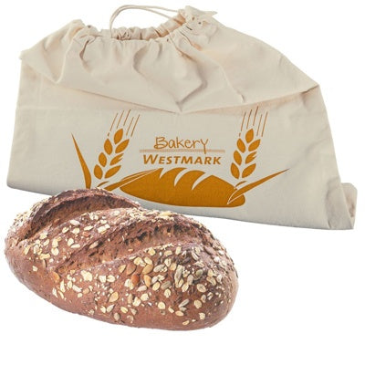 Westmark Broodzak, naturel, broodzak naast een vers bruinbrood met noten en zaden