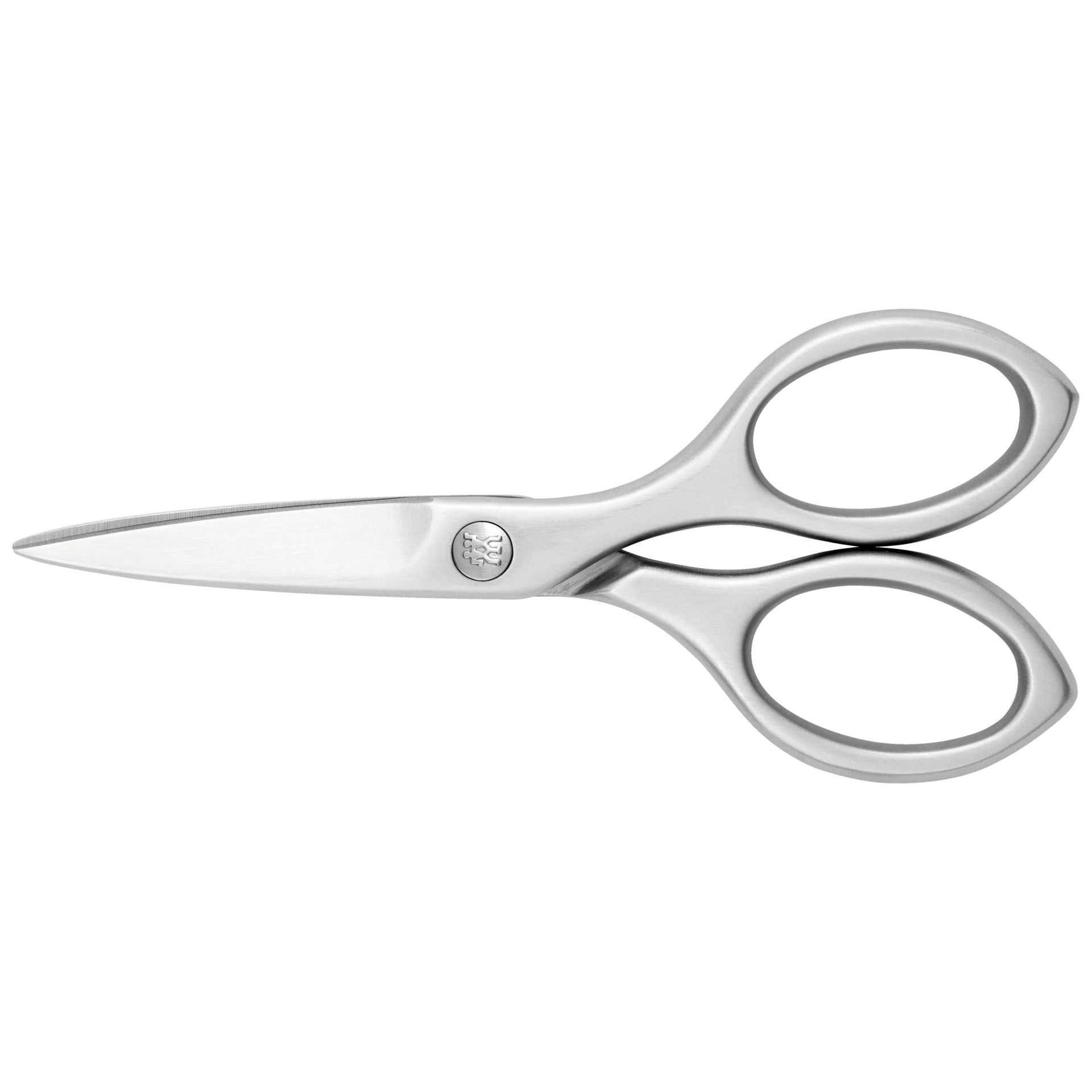 Zwilling Twin Select Huishoudschaar tussen cadeauverpakkingen en groen