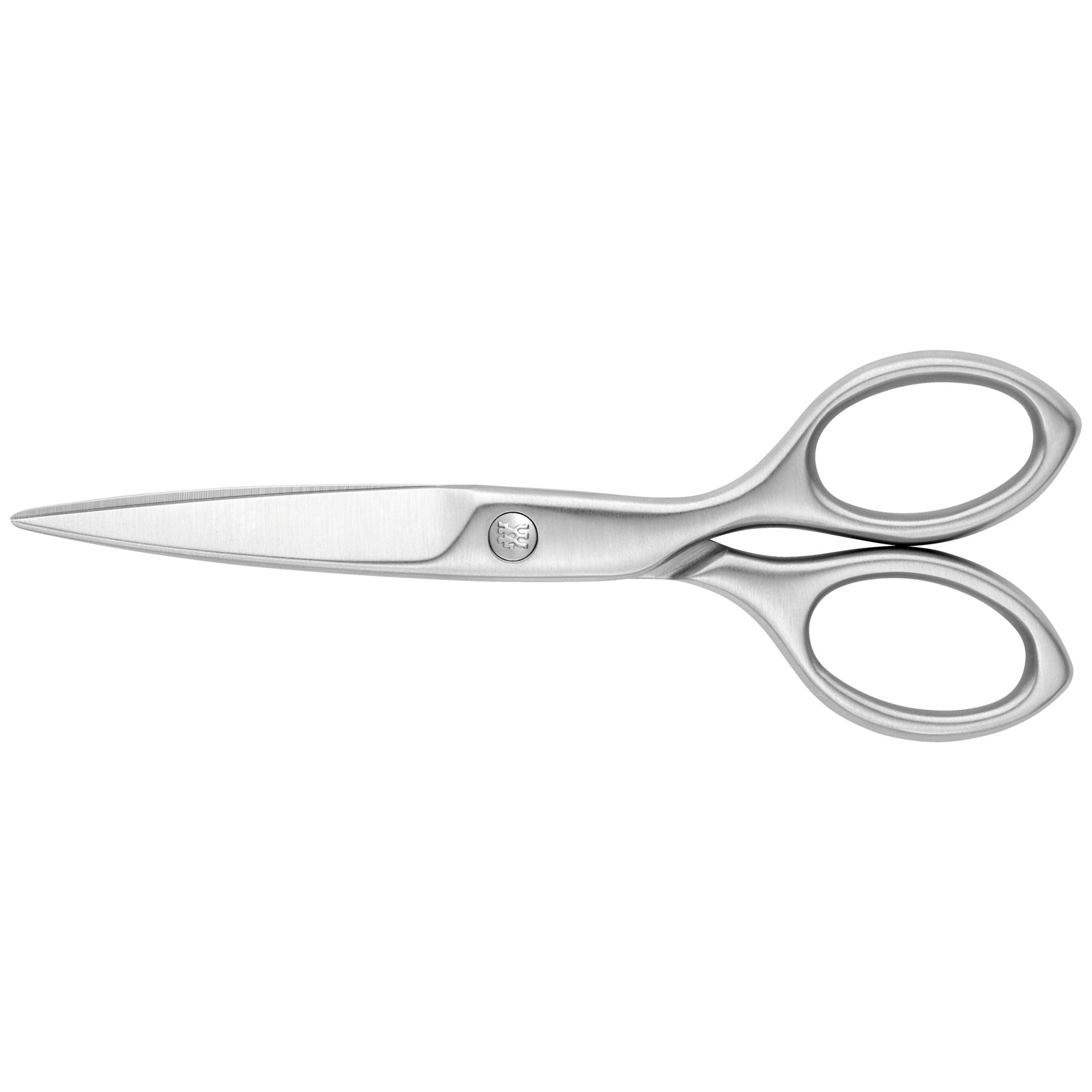 Zwilling Twin Select Huishoudschaar tussen inpakpapier en cadeaulabels
