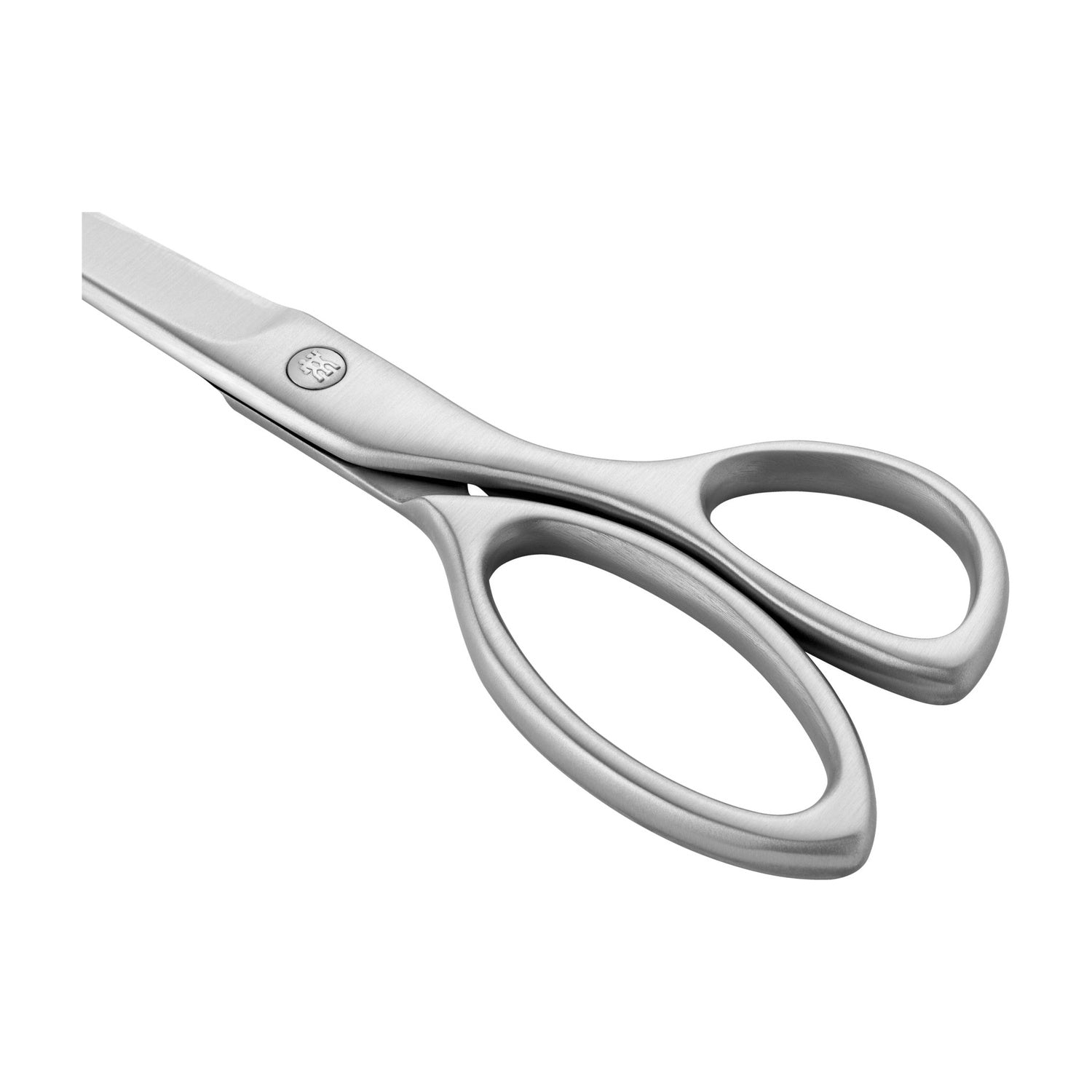 Zwilling Twin Select Huishoudschaar tussen cadeauverpakkingen en groen