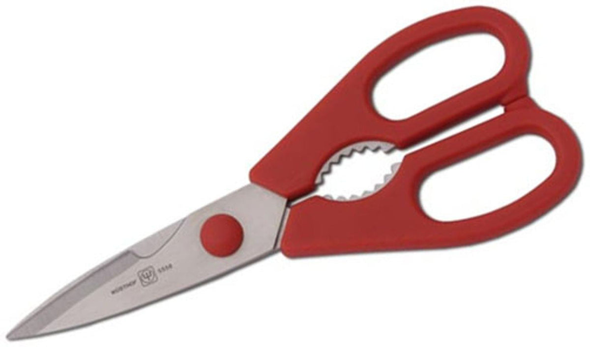 Wüsthof keukenschaar met rood kunststof handvat, gekartelde RVS bladen en ingebouwde notenkraker bij de draaipunt, op een witte achtergrond.