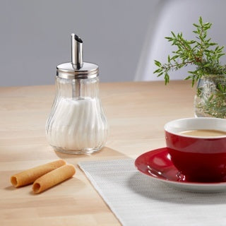 Westmark Berlin Suikerdispenser, gevuld met suiker, op tafel naast koffie en koekjes