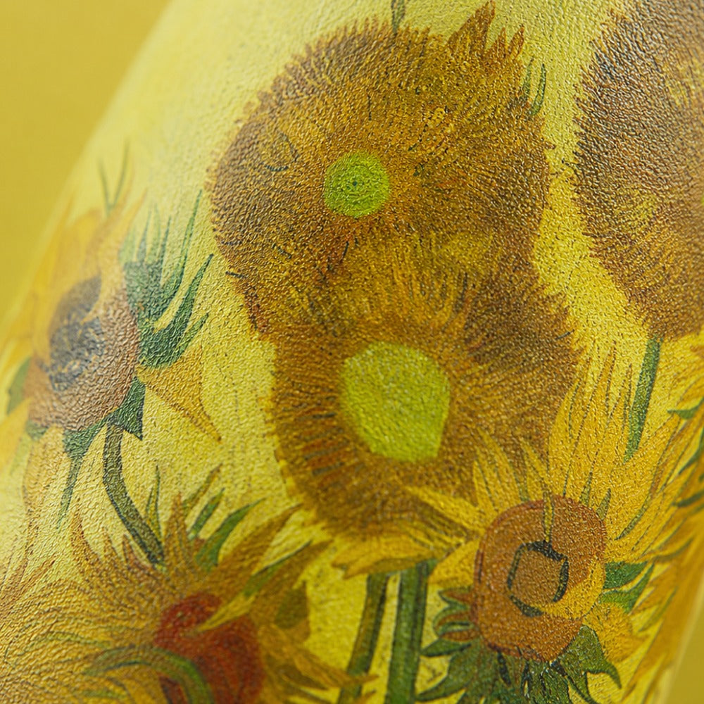 Close-up van het Zonnebloemen-motief op de IZY Thermosbeker