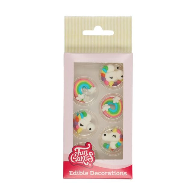Verpakking met suikerdecoraties van regenbogen en eenhoornkoppen