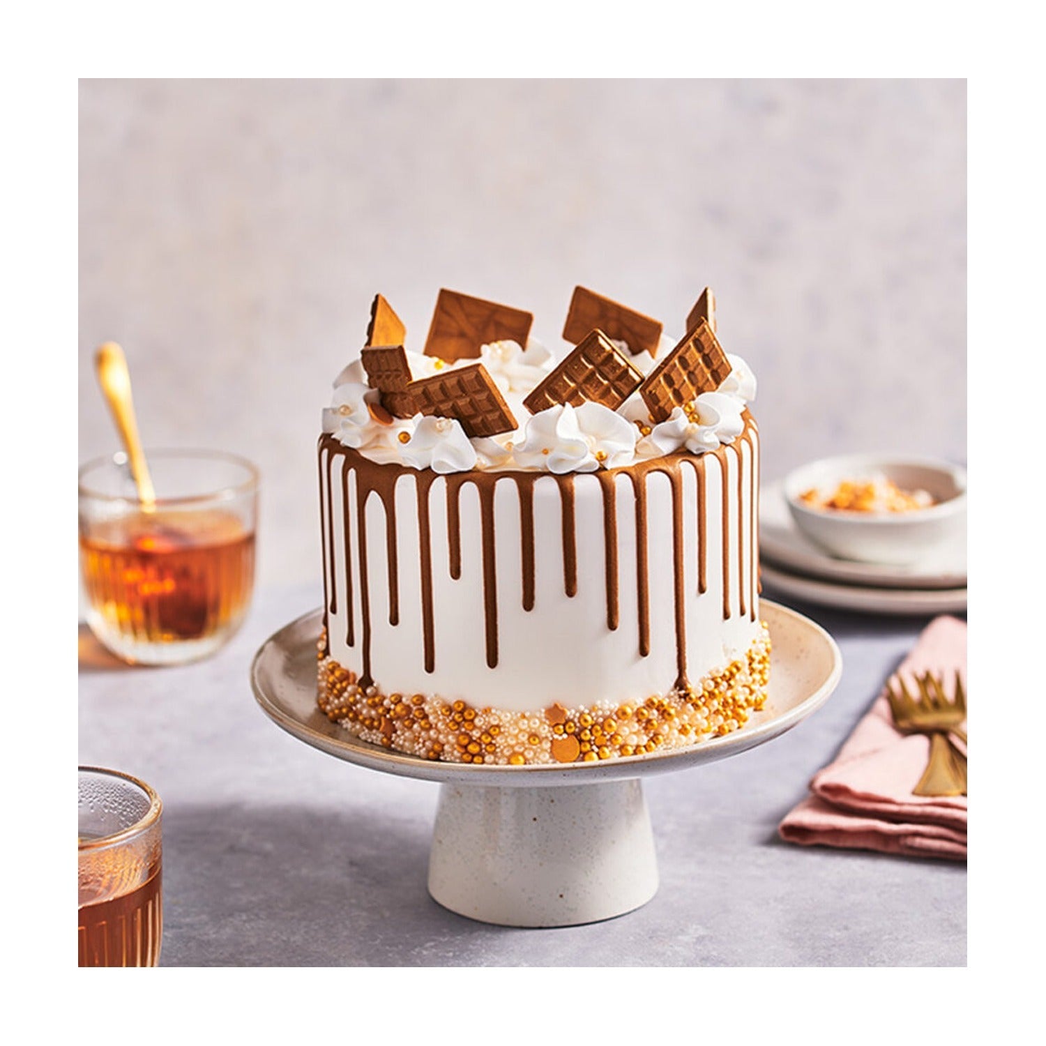 FunCakes Choco Drip Donker Goud - 180 gram op witte achtergrond