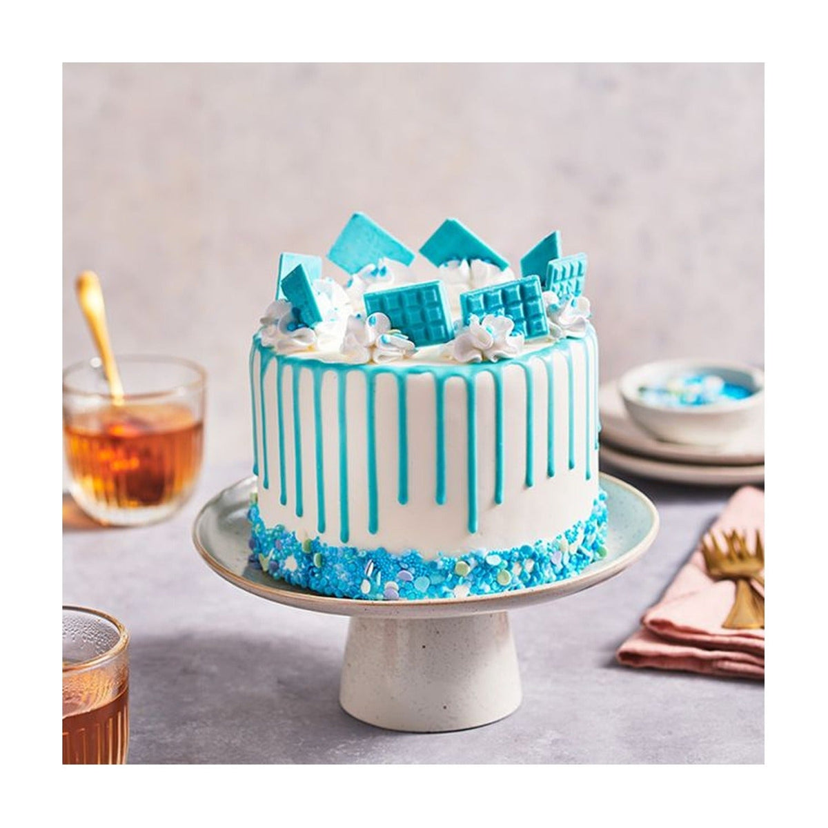 FunCakes Choco Drip Licht blauw - 180 gram op witte achtergrond