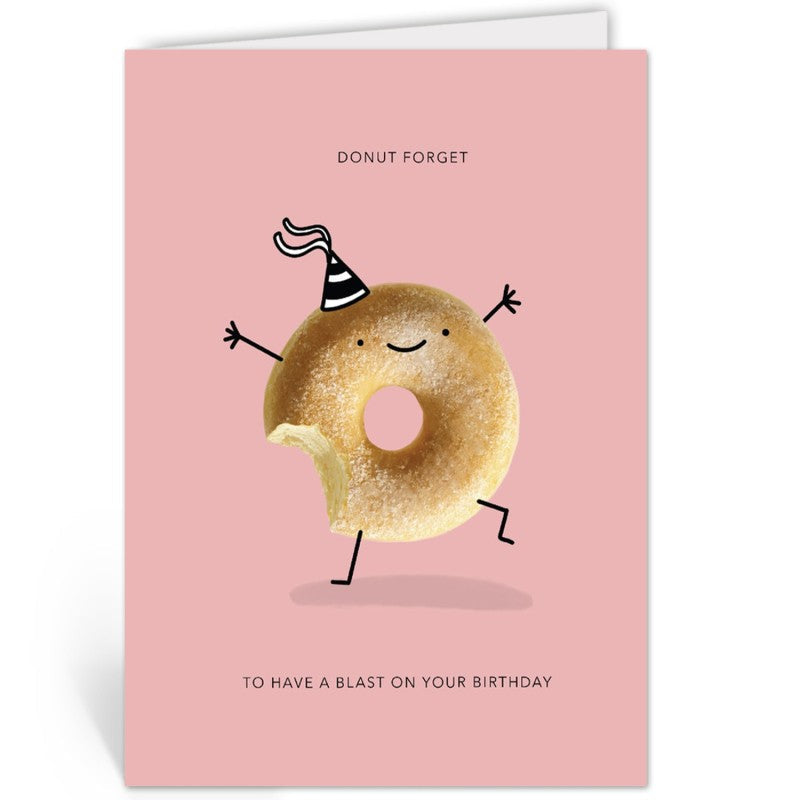 Wenskaart met een dansende donut in feesthoedje op een roze voorzijde, rechtop staand geopend tegen een witte achtergrond