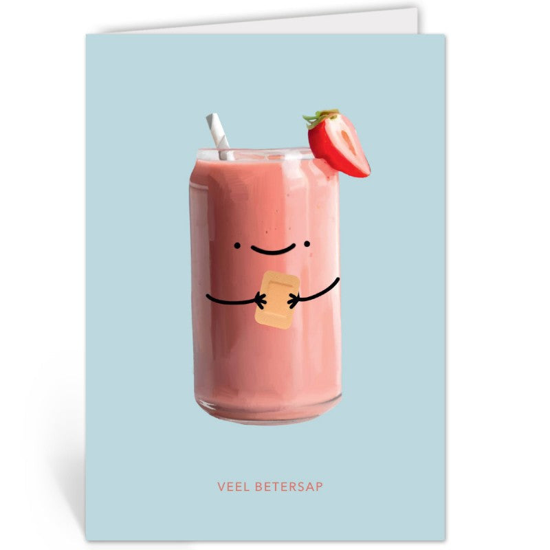 Lichtblauwe beterschapskaart met een smoothieblikje-illustratie, liggend op een kraftpapieren envelop.