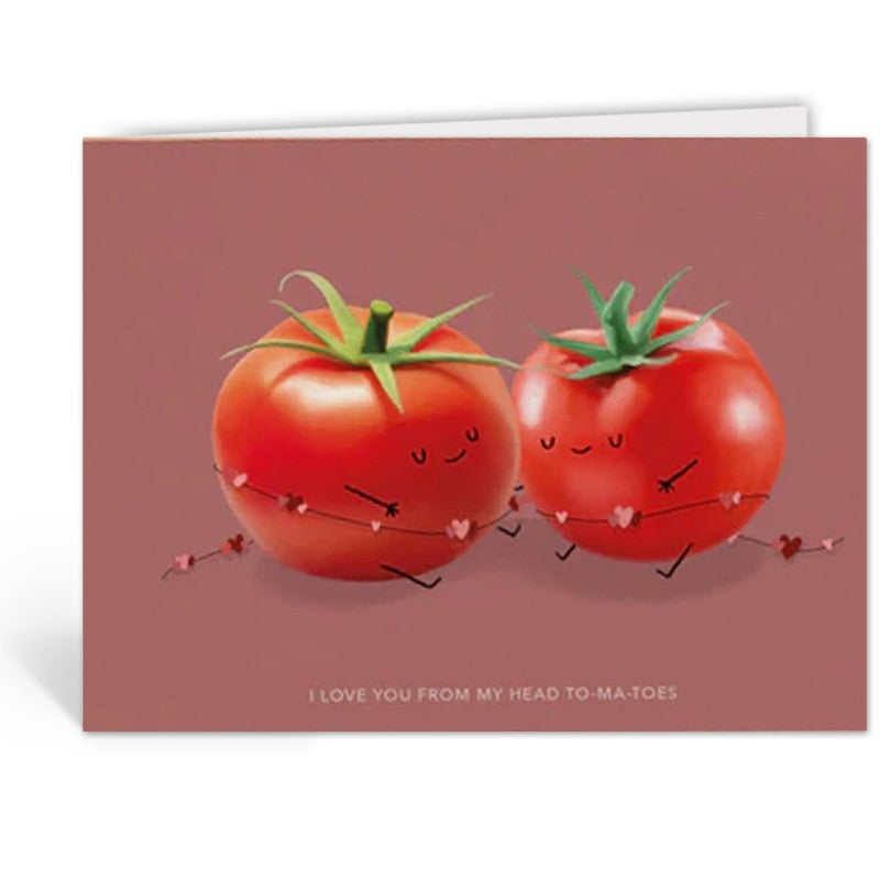 Opengevouwen wenskaart 'I Love You From My Head To-Ma-Toes' van Depre Design met twee tomaatjes hand in hand, witte envelop op de achtergrond.