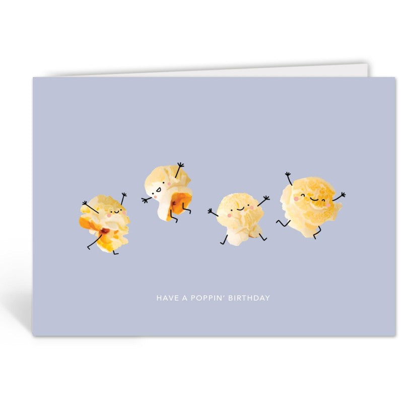 Verjaardagskaart van Depre Design met vier dansende popcorn-figuurtjes en de tekst "Have a poppin' birthday" op een lichtblauwe achtergrond.