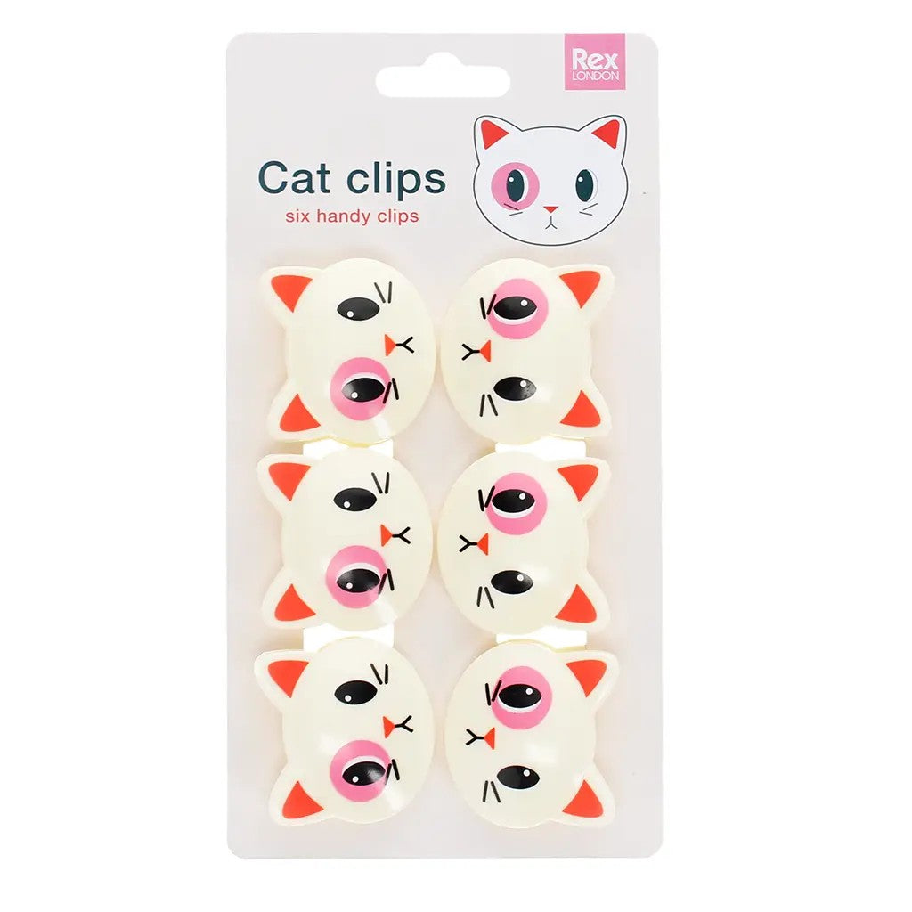 Zes crèmekleurige kattenkopclips op een kartonnen kaart met de tekst Cat clips six handy clips en het Rex London-logo