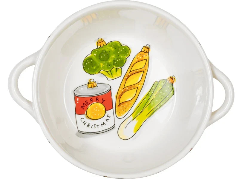De binnenkant van de terrine met broccoli, stokbrood, prei en een blik met Merry Christmas