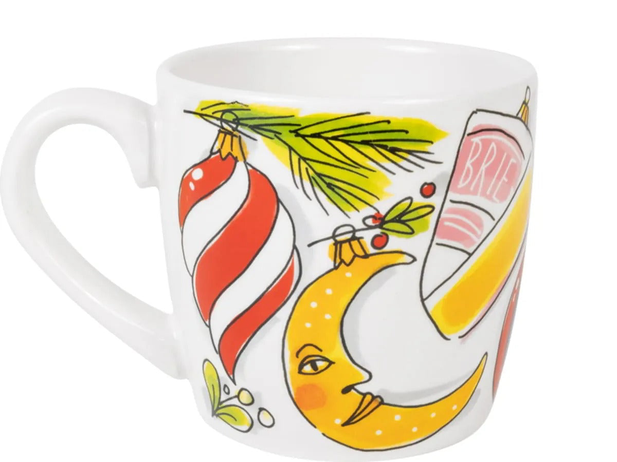De cappuccinobeker met een maan, een kerstbal en een envelop met Brie
