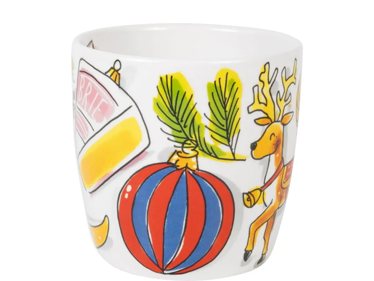 De beker met een blauw-rode kerstbal, een rendier en een envelop met Brie