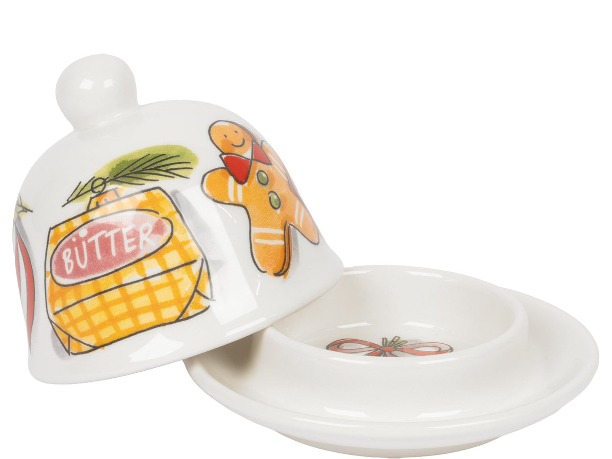 De geopende botervloot met een schaaltje met een strik en maretak