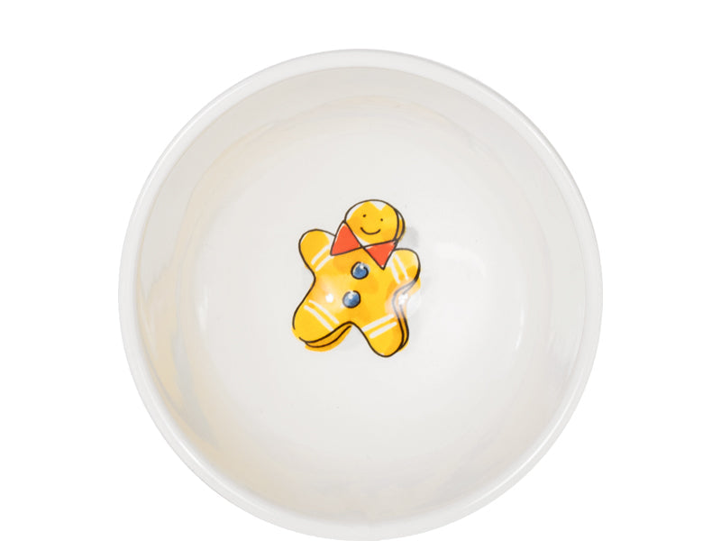 Binnenkant van de kom met een peperkoekmannetje op de bodem