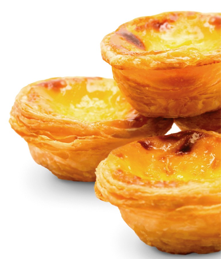 Ibili Pasteis de Nata Vormpjes 6-delig, close-up van gebakken pasteis de nata met karamelkleurige bovenkant in de vormpjes