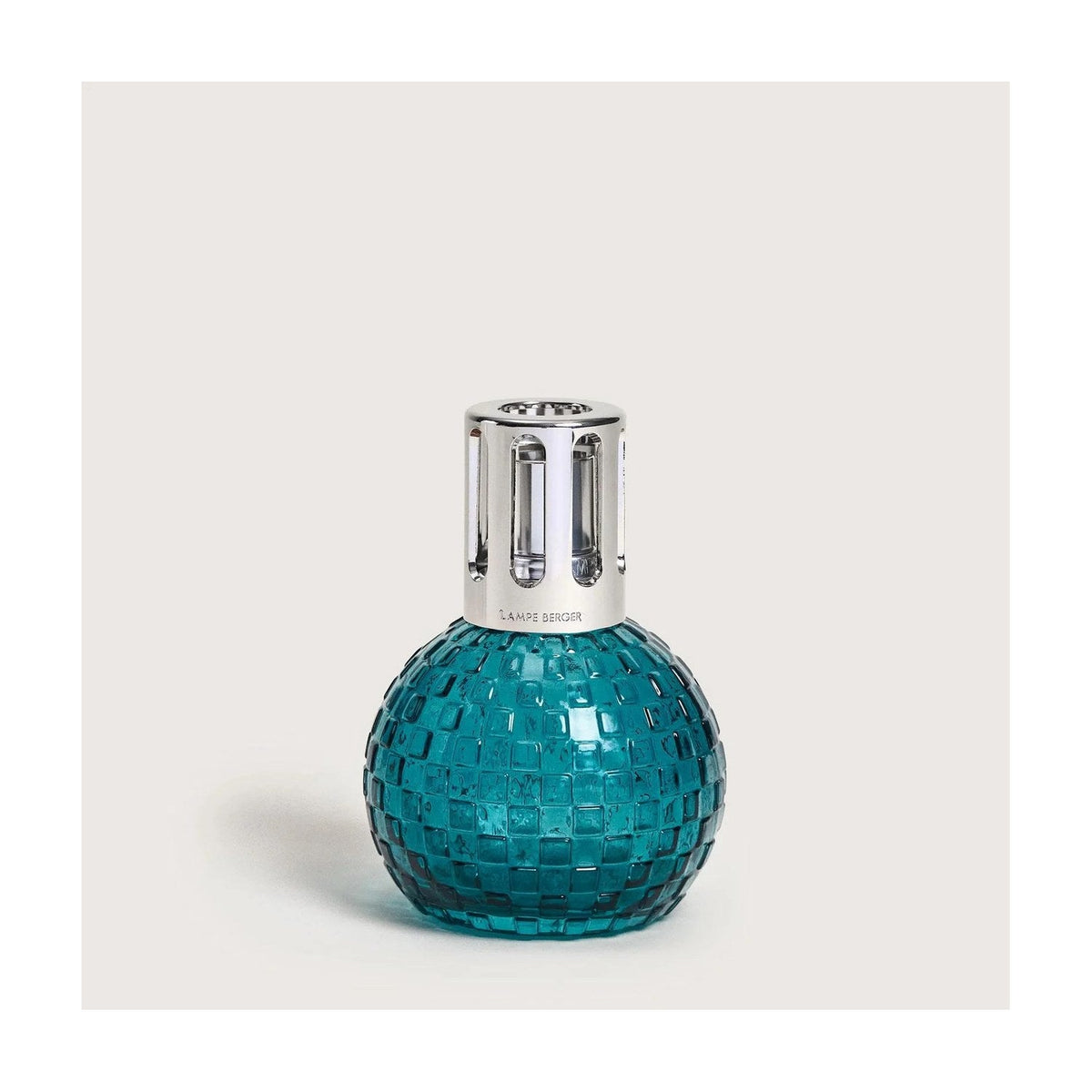 Lampe Berger Giftset Disco Verte op een lichte achtergrond